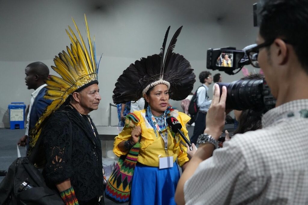 Indigenous leaders are interviewed at COP30 in Belém, Brazil. Photo by 10 Billion Solutions / Mariana Castaño Cano.
